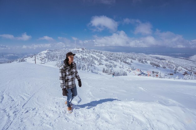 Man skiing on snow covered landscape