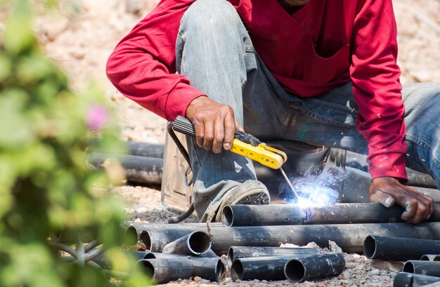 A man skilled working factory welder