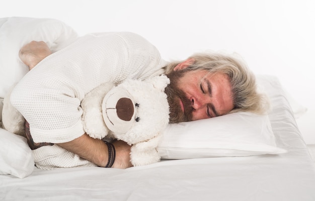 Man sleep with teddy bear sleep sweet dreams bearded man with teddy bear