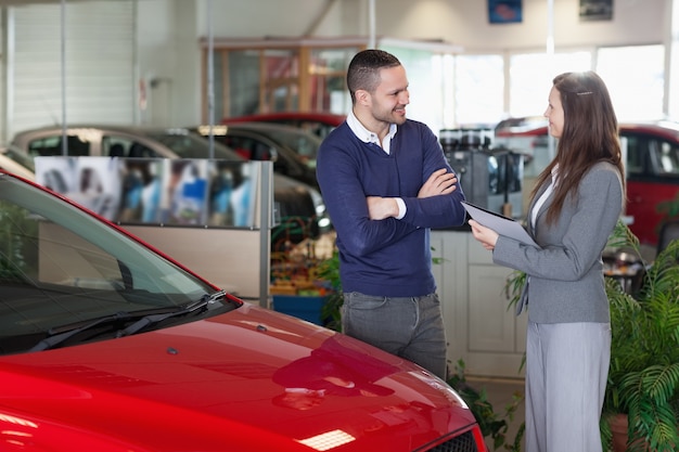 Man speaking to a businesswoman