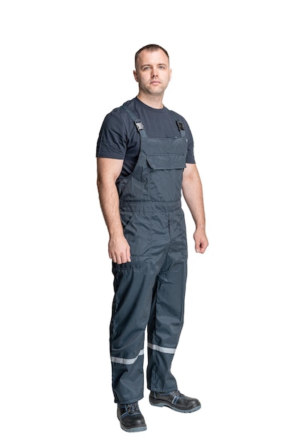 Man in special clothes for workers on a white isolated background a man in uniform