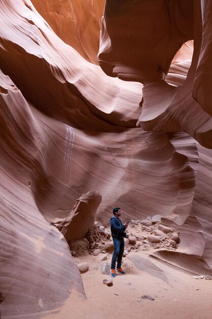 Man standing in antelope canyon