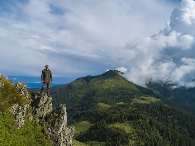 The man standing on the beautiful mountain