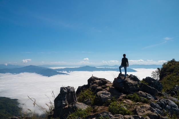 man standing on the cliff 