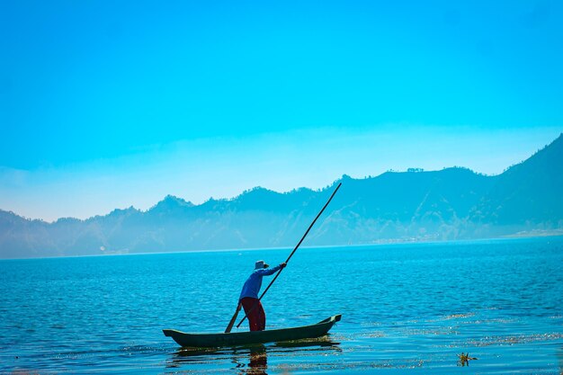 Man standing on fishing boat