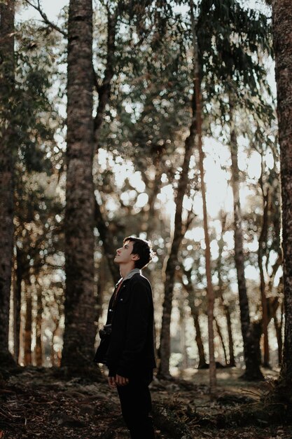 Man standing in forest