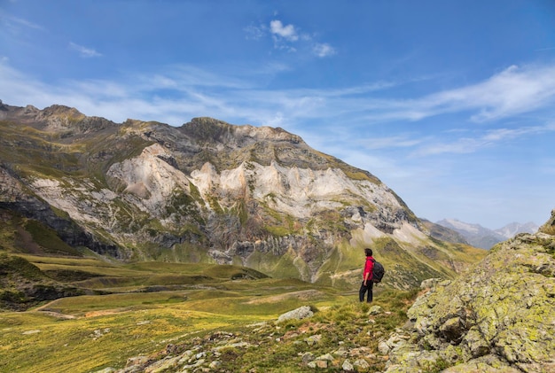 man standing on mountain against sky