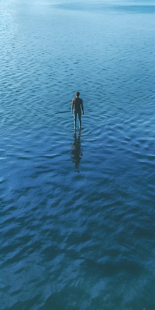 A man standing in the water