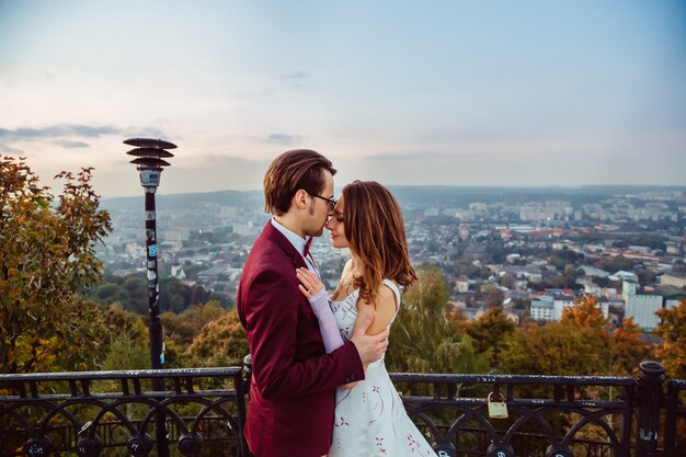 The man stands face to face with his wife