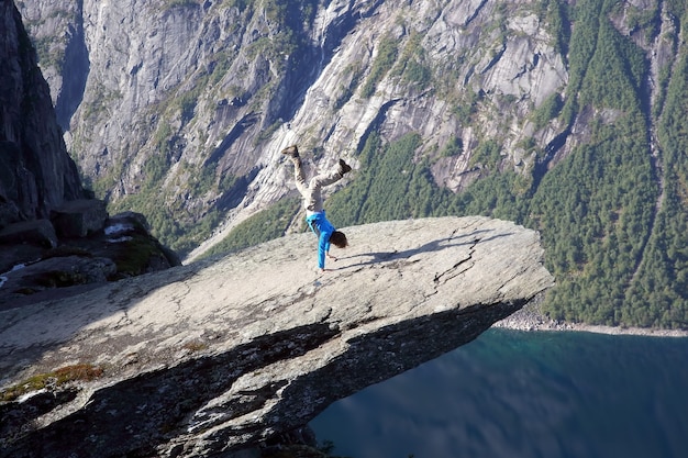 Man stands on his hands in Troll language. Norway