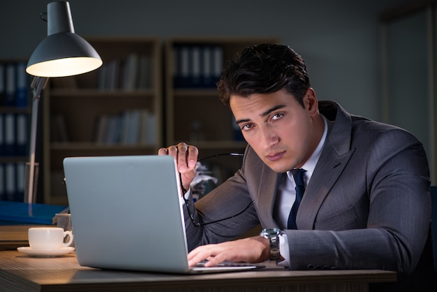 Man staying in the office for long hours