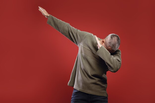 man striking a celebratory pose