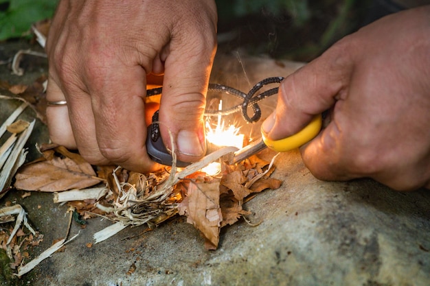 Man striking fire with the flint and steel