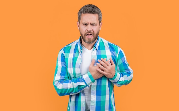 Man suffer with heartache in studio heartache suffer of caucasian man in shirt