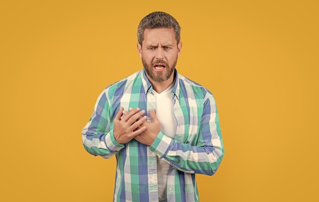 man suffer with heartache in studio heartache suffer of caucasian man in shirt