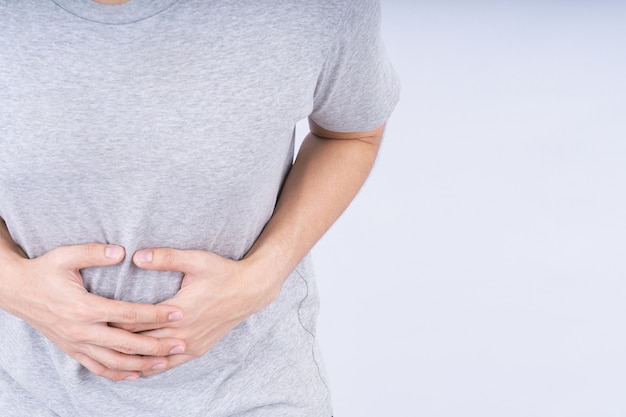 man suffering from abdominal pain