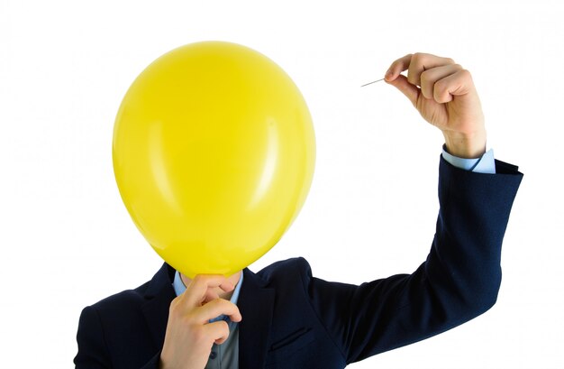 Photo man in suit holding needle over yellow air balloon