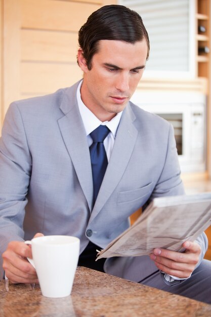 Man in suit making breakfast