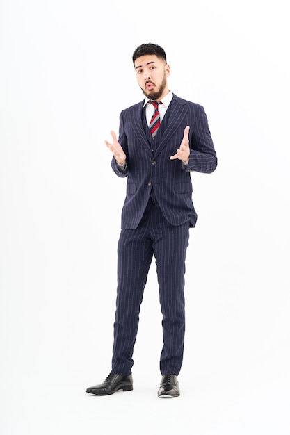 A man in a suit posing in thought