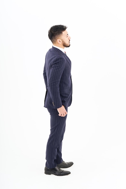 A man in a suit standing