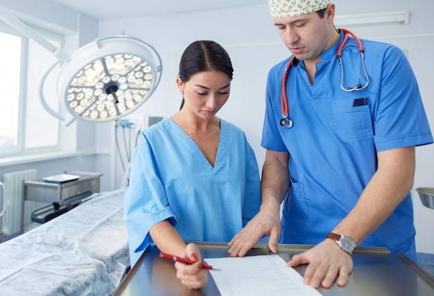 Man surgeon at work in operating room