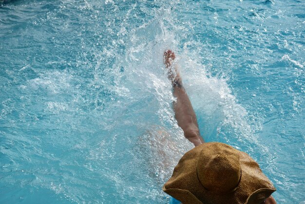 Man swimming in pool