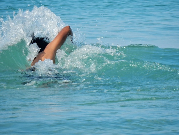 Man swimming in sea