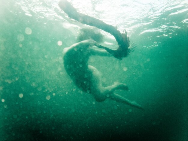 Man swimming in sea