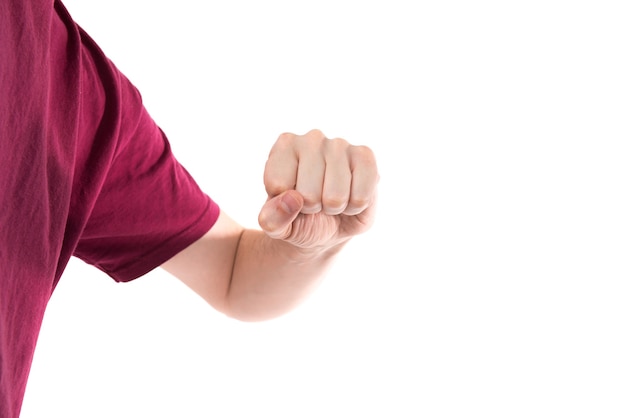 Man in t-shirt with clenched fist isolated on white background