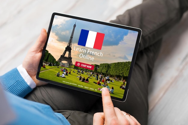 Man taking online courses and learning french language