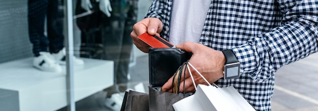 Man taking out credit card