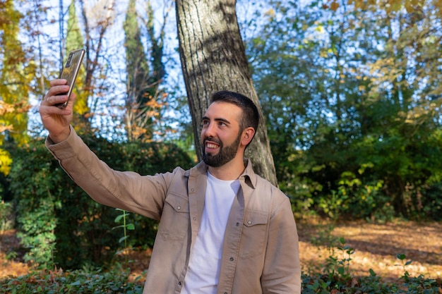 Man taking a selfie in the street