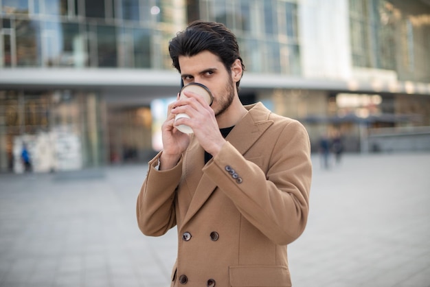 Man talking on the phone while walking down a stair