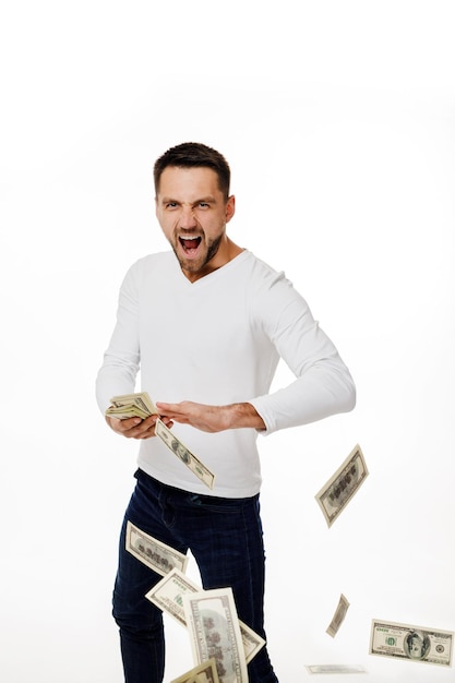 man throwing out money banknotes