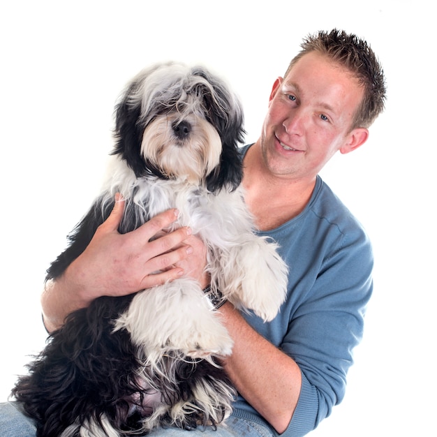 man and  tibetan terrier