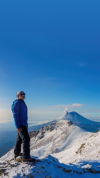 Man on the top of the mountain