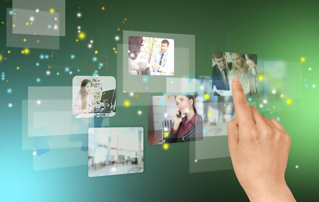 man touching business elements icons on screen