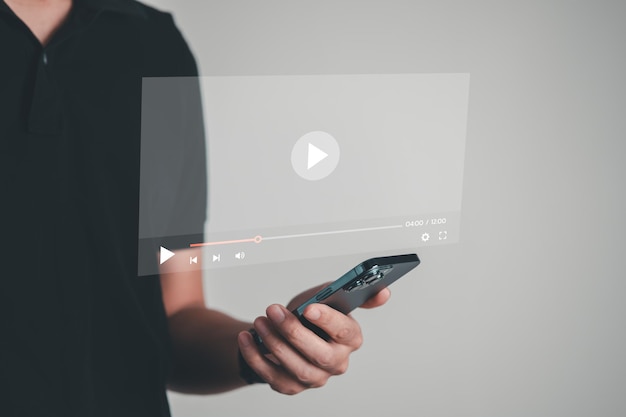 Photo the man touching play icon on video online video content creator concept