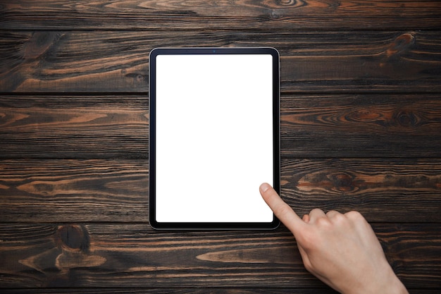 Man touching the screen of a tablet pc