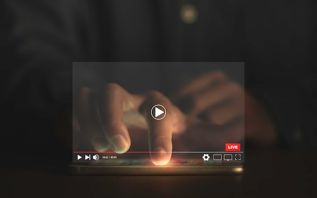 Man touching smartphone to watching and live streaming window for Video streaming on internet and multimedia technology concept