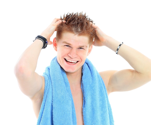 Man toweling hair after shower