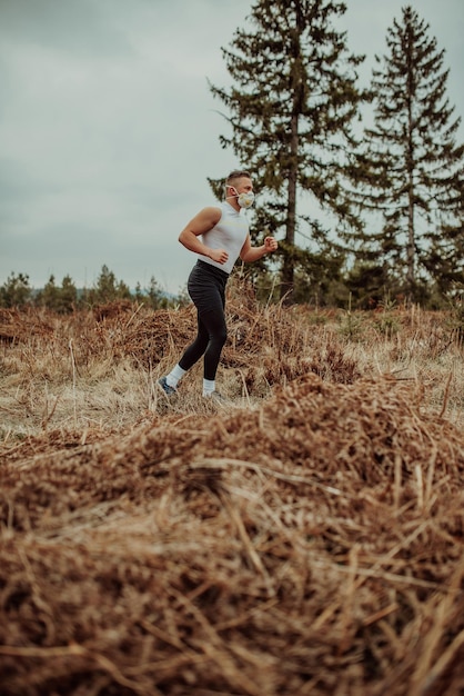 Man training with a mask due to the corona virus