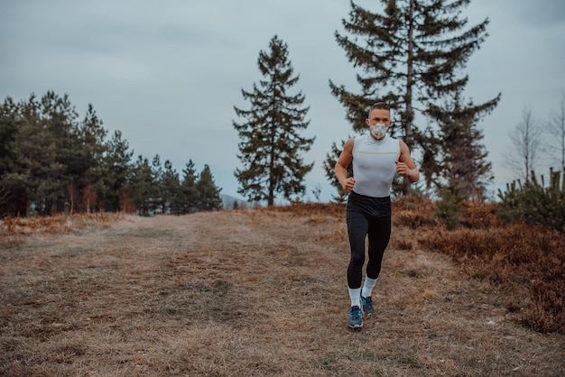 Man training with a mask due to the corona virus