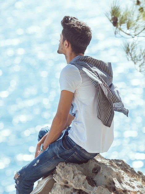 Man traveler near the sea