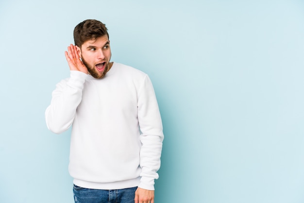 Man trying to listen to a gossip