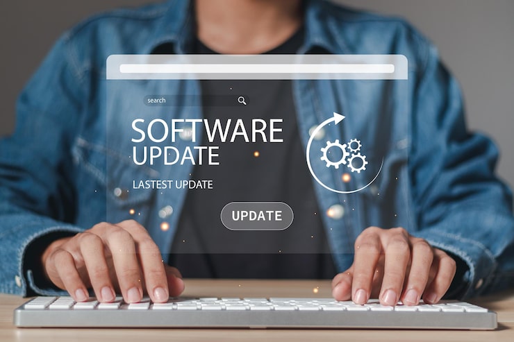 Photo man typing keyboard with installing update process software updates or operating system upgrades to keep your device up to date with enhanced functionality in new versions and improved security