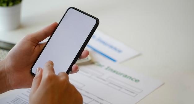 Man using blank screen smart phone