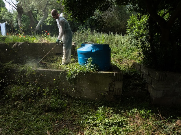 Man using brush cutter