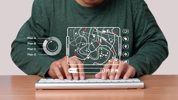 Photo man using computer keyboard to searching information location point