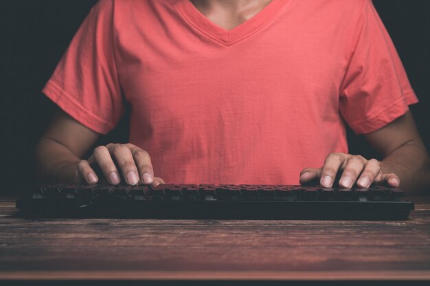 A man using a computer keyboard